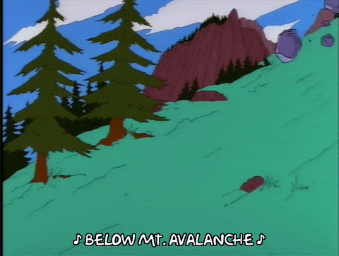 Animated GIF of rocks of varying sizes tumbling down a green hill. The caption reads: Below Mt. Avalanche
